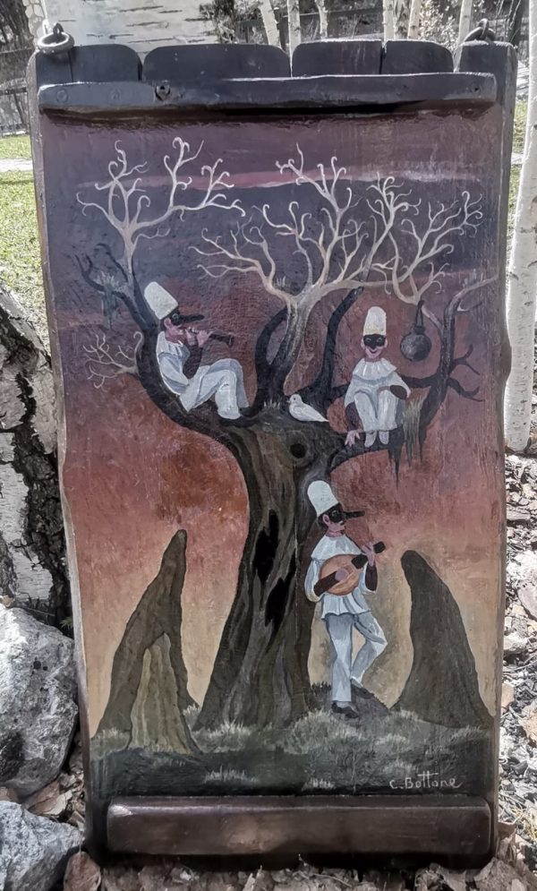 Pannello I tre Pulcinella su tinte calde
