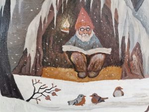 Pannello Gnometto che legge accanto al fuoco